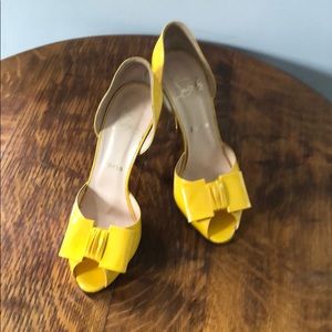 Yellow patent leather Louboutins